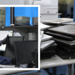 Centro de consolidación RAEE con computadores y periféricos clasificados para gestión ambiental responsable en Colombia.